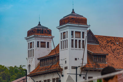 Low angle view of buildings against sky in jakarta 