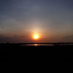 Scenic view of silhouette landscape against sky during sunset