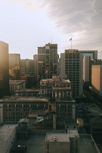 High angle view of buildings in city against sky