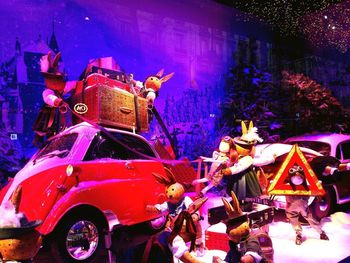 Vintage car parked at night