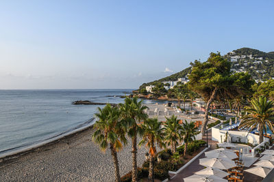 Scenic view of swimming pool by sea against sky. santa eulalia del rio