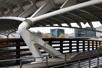 Footbridge over buildings in city