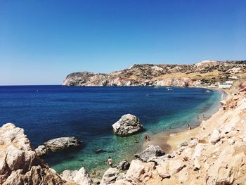 Scenic view of sea against clear blue sky