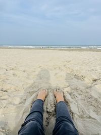 Low section of person on beach