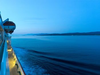 Scenic view of sea against blue sky