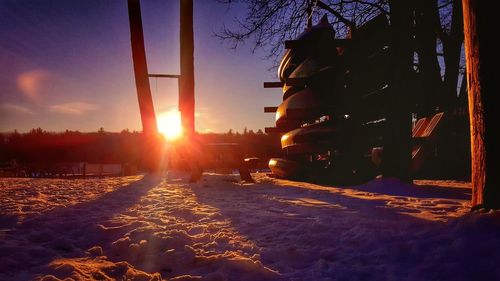 Sun shining over city during winter