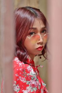 Portrait of young woman looking away