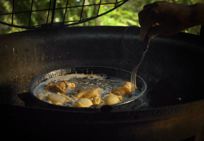 Close-up of person preparing food