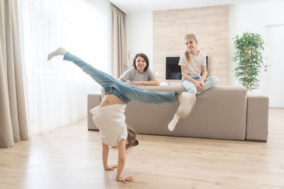 Young couple on sofa at home