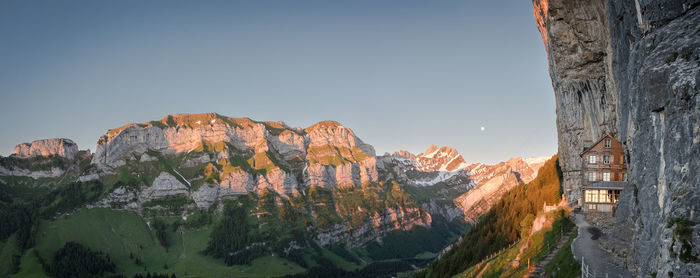 View of rocky mountains against clear sky