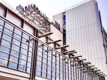 Low angle view of modern building against sky