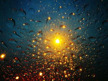 Close-up of raindrops on windshield