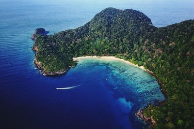 High angle view of sea against blue sky