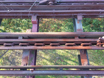 Railing with trees in background