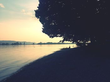 Scenic view of sea at sunset