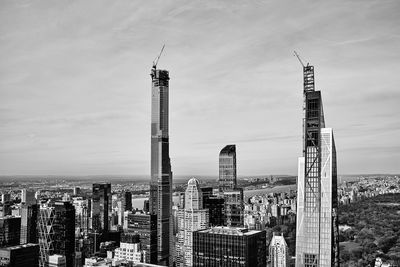 Modern buildings in city against sky