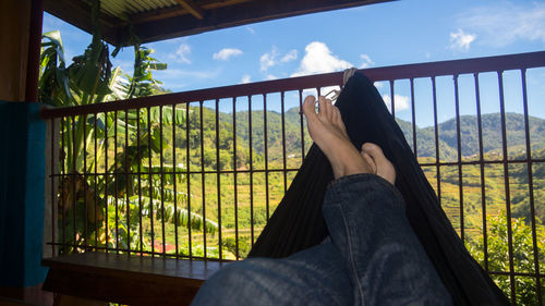 Low section of woman in balcony