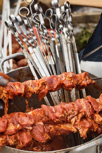 High angle view of meat on barbecue grill