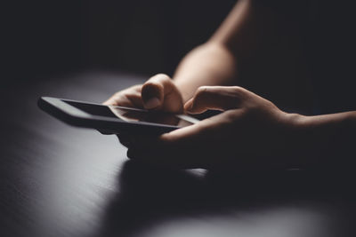 Close-up of person using mobile phone