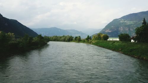 Scenic view of river and mountains