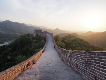 Scenic view of mountains against sky during sunset