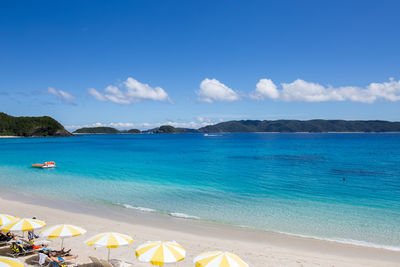 Scenic view of sea against blue sky