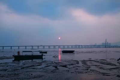 Scenic view of sea against sky at sunset