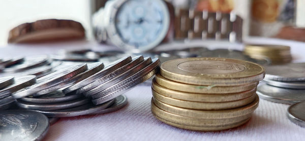 Close-up of coins on table