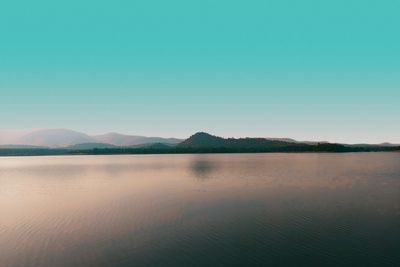 Scenic view of lake against clear sky