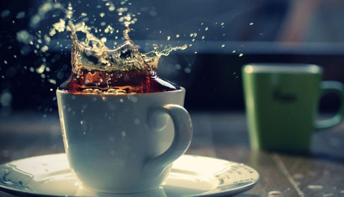 Close-up of coffee cup on table