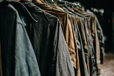 Close-up of clothes hanging in store