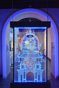 Illuminated building seen through glass