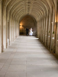 View of people sitting in corridor