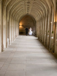 View of people sitting in corridor