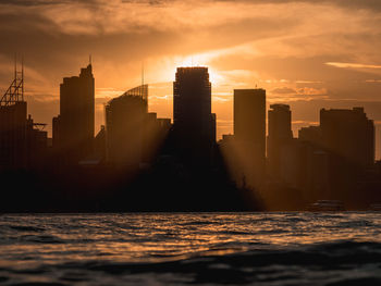 View of skyscrapers at sunset