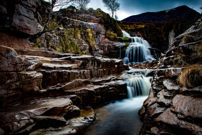 Scenic view of waterfall in forest