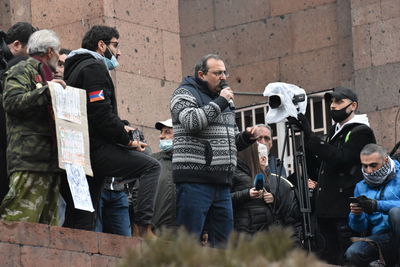 Group of people standing in front of building