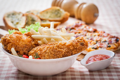 Close-up of food served on table