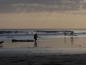 Scenic view of sea at sunset