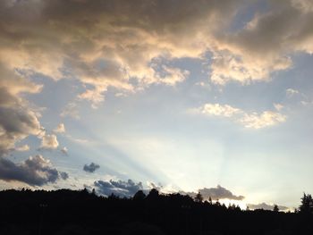 Scenic view of landscape against cloudy sky