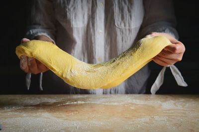 Close-up of man preparing food