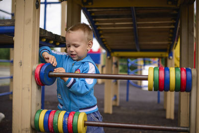 Boy playing in playground