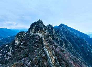 Rock formations on mountain against sky