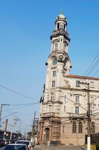 Low angle view of building against blue sky