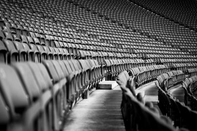 Empty chairs in stadium