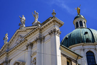 Low angle view of statue of cathedral against sky