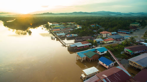 High angle view of houses and buildings against sky