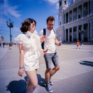 People walking on street in city