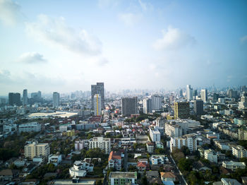 High angle view of buildings in city against sky