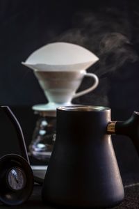 Close-up of coffee cup on table